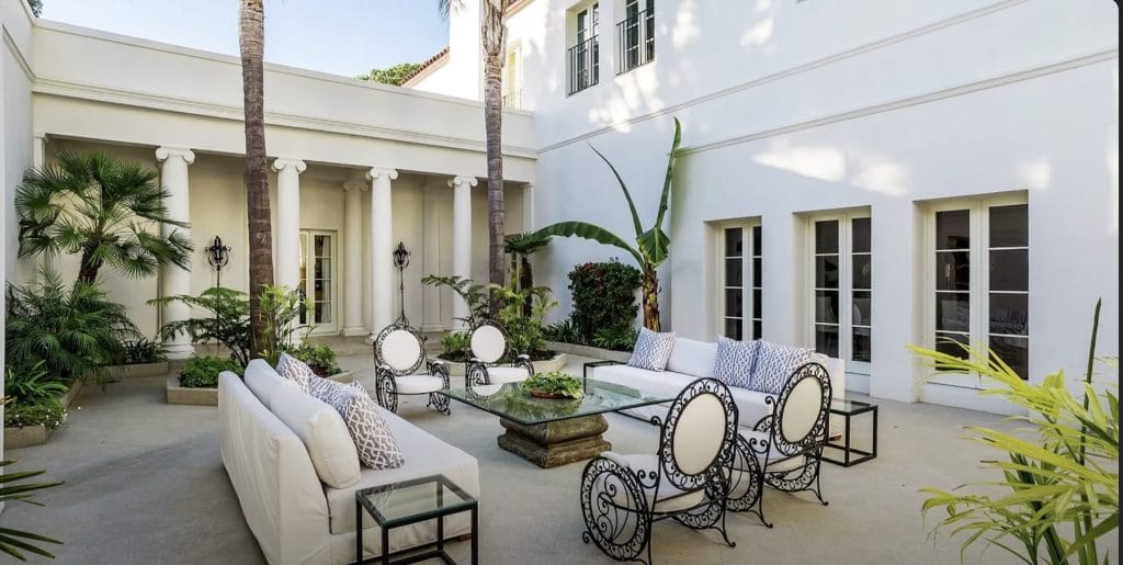 The outside sitting area within the mansion.